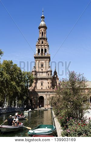 SEVILLE, SPAIN - September 13, 2015: Boats near the northern tower of the Plaza de Espana (Spain Square) on September 13, 2015 in Seville, Spain