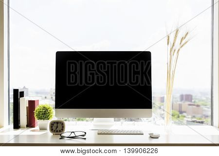 Creative Workplace With Blank Monitor