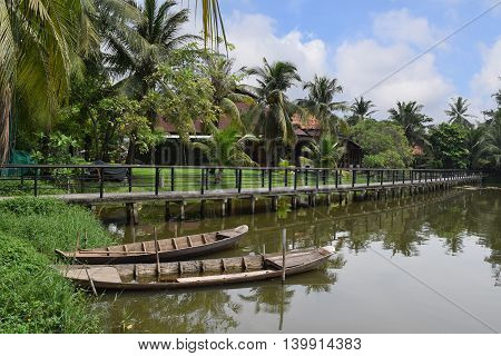 rural village with traditional boat bridge in Van Thanh ho chi minh city vietnam