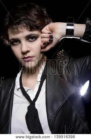 Fashionable depiction of wearable tech smart watch on a punk rock female model