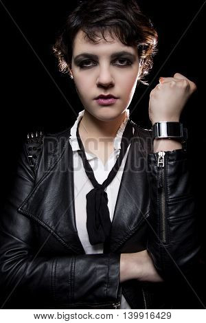 Fashionable depiction of wearable tech smart watch on a punk rock female model