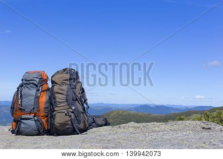 Camping with backpacks in the mountains with views of the mountains