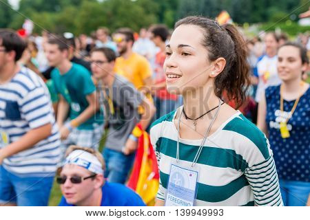 Poznan POLAND - JULY 24 2016: pilgrims praying dancing and singing during Days In Dioceses just before The World Youth Day in Krakow; WYD is a meeting of youth from all over the world