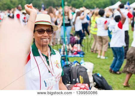 Poznan POLAND - JULY 24 2016: pilgrims praying dancing and singing during Days In Dioceses just before The World Youth Day in Krakow; WYD is a meeting of youth from all over the world