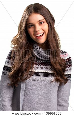 Smiling woman on white background. Gray pullover with pattern. Give me a smile. Find a reason to rejoice.