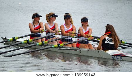 St Neots, Cambridgeshire, England - July 23, 2016: Close up of Female Scullers, Newark Coxed four on the River Ouse at St Neots.