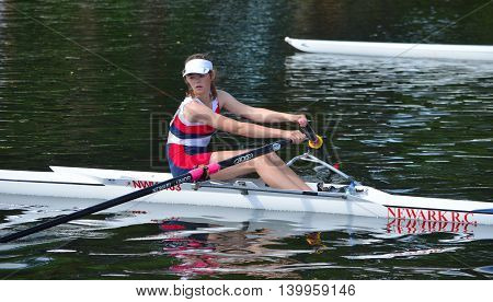 St Neots, Cambridgeshire, England - July 24, 2016: Close up of Female Sculler, Newark Club on the River Ouse at St Neots.