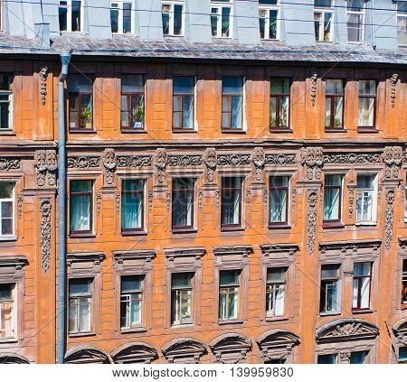The windows of the old house on Pushkin Street in St. Petersburg.