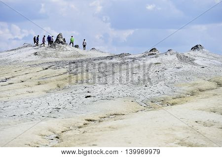 BERCA ROMANIA - JULY 2: Tourists visiting the mud active volcanoes in Berca on June 2 2016 in Romania