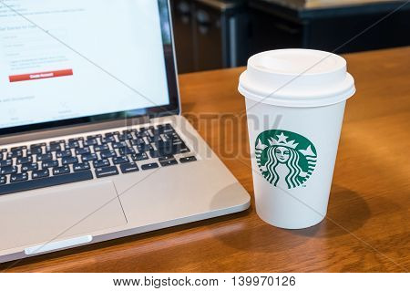 OSAKA JAPAN JUL 09 2016: A tall Starbucks coffee in starbucks offee shop. Starbucks is the world's largest coffee house with over 20000 stores in 61 countries.