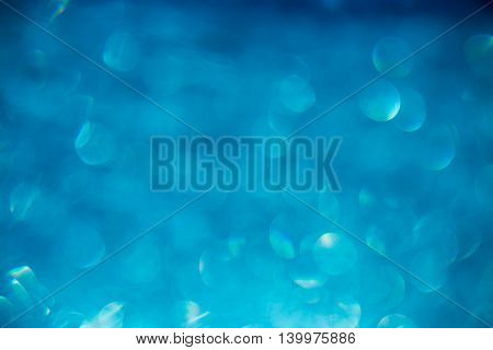 bokeh on a blue background blur, shiny, defocused.