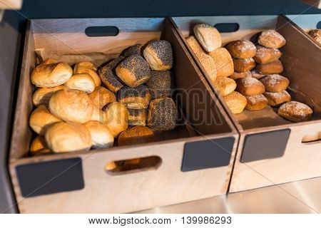 Breadbaskets full with many types of buns
