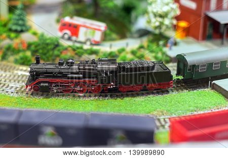 City In Miniature. Model Of Train On Railstation.