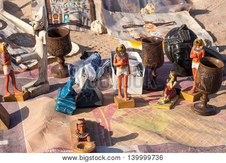EGYPT, SHARM EL-SHEIKH - JULY 26, 2015: Bedouin Egyptian sells souvenirs on the beach
