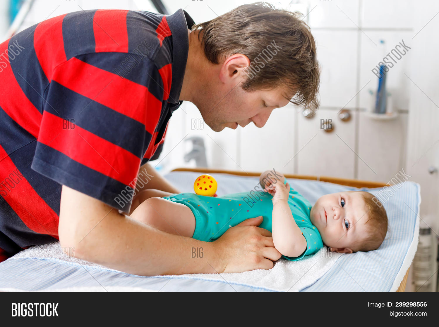 daghter diaper Loving Father Changing Image & Photo (Free Trial) | Bigstock