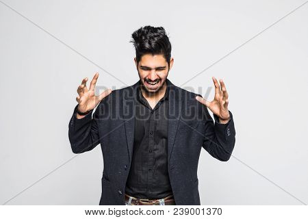 A Young Indian Man Shocked, Open His Mouth Screaming, Reised His Both Hands , Isolated On A White Ba