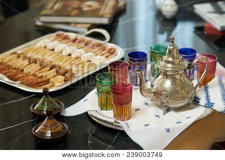 Traditional Moroccan Tea With Ramadan Cookies On Festive Silver Tray.