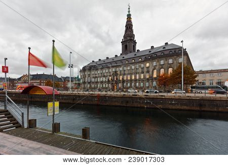 COPENHAGEN, DENMARK - NOVEMBER 6, 2016: Traffic at the Christiansborg Palace. It is the seat of the Danish Parliament, the Danish Prime Minister's Office and the Supreme Court of Denmark