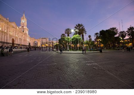 AREQUIPA PERU NOVEMBER 9: Main square of Arequipa with church on november 9 2015 in Arequipa Peru. Arequipa's Plaza de Armas is one of the most beautiful in Peru.