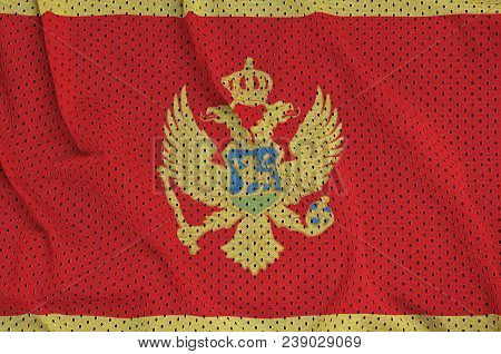 Montenegro Flag Printed On A Polyester Nylon Sportswear Mesh Fabric With Some Folds