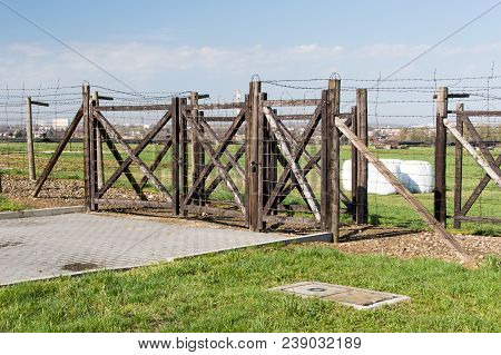 Lublin, Poland - April 14, 2018: Wooden Gate In Majdanek Nazi German Concentration Camp.