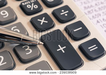 Closeup The Silver Modern Pen On Calculator And Summary Financial Statement In Background, Vintage F