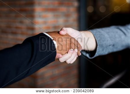 Businessmen shaking hands in a agreeement