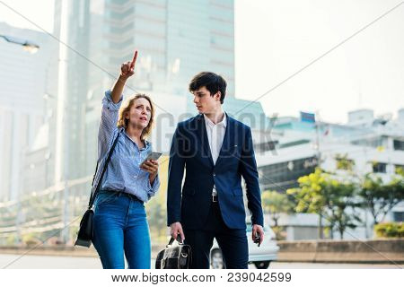 Couple walking on downtown together