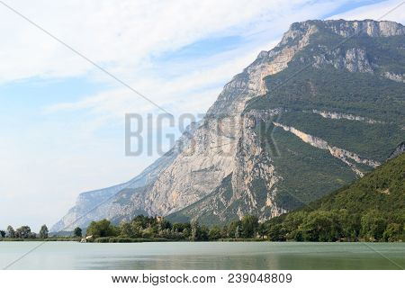 Castle Castel Toblino At Lake Lago Di Toblino And Mountain Panorama In Italy