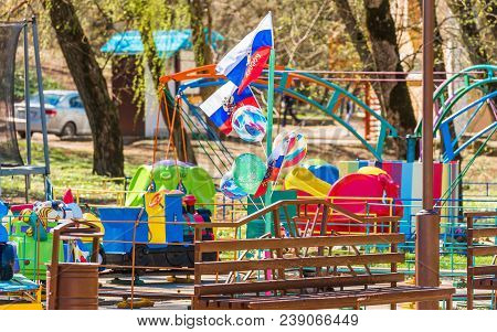 View Of Children's Attractions In The Park, Goryachy Klyuch, Russia.
