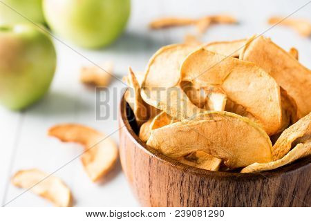 Dried Apples In A Wooden Bowl Ripe Green Apples On The Table