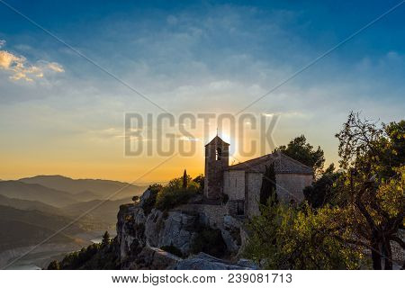 View Of The Romanesque Church Of Santa Maria De Siurana At Sunset In Siurana De Prades, Tarragona, S