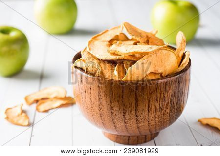 Dried Apples In A Wooden Bowl Ripe Green Apples On The Table