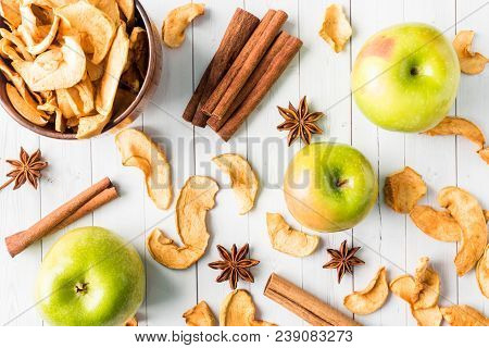 Dried Apples In A Wooden Bowl Ripe Green Apples On The Table