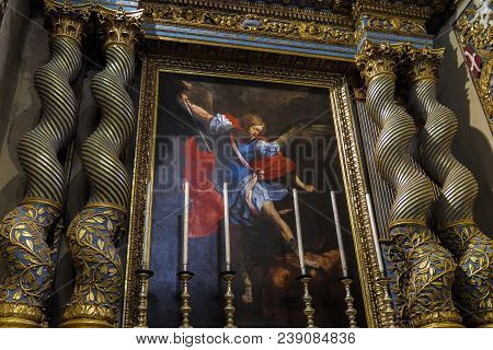 Valletta, Malta - August 04 2016: St John Roman Catholic Co-cathedral Interior Art. Altarpiece Depic