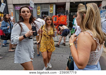 London, Great Britain, April 21, 2018 : Young Women Dancing In The Street For An Impromptu Gig In So