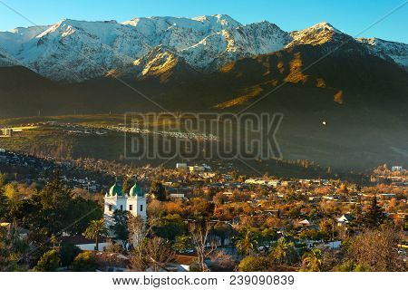 View Of Los Dominicos Neighborhood And Los Dominicos Church With Los Andes Mountain Range As A Backd