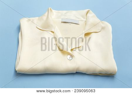 The Silk Folded Sleepwear On Blue Background