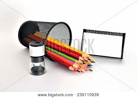 Color Pencils, Pencil Sharpener, Business Card On White Background