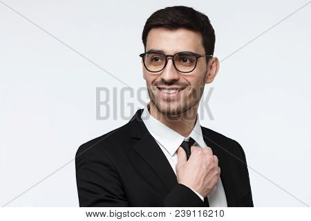 Closeup Photo Of Handsome Caucasian Businessman Pictured Isolated On Grey Background Standing In Bla
