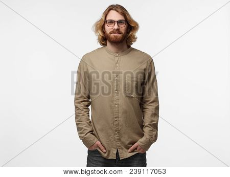 Half-length Portrait Of Young Handsome Scandinavian Man With Moustache And Beard Pictured Isolated O