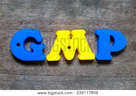 Color Alphabet In Word Gmp (abbreviation Of Good Manufacturing Practice) On Wood Background