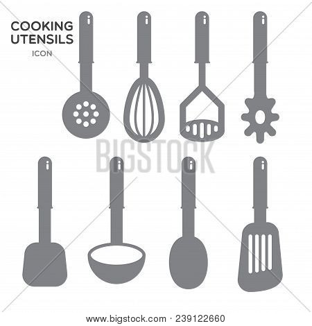 Hand Held Silicone Cooking Utensils With Colorful Handle, On Light Blue Background.