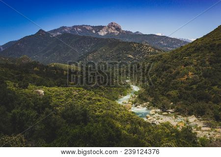 Middle Fork Kaweah River Running Through Sequoia National Park, California With The Peak Of Moro Roc
