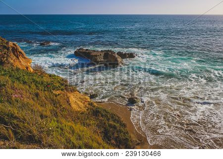 Beautiful Elevated View Of Laguna Beach On A Sunny Day With Stunning Blue Water And Waves Crashing I