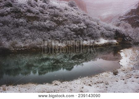 Calm Verde River With Reflections Of Snow-covered Red Rock Formations In Verde Canyon On A Snowy Day