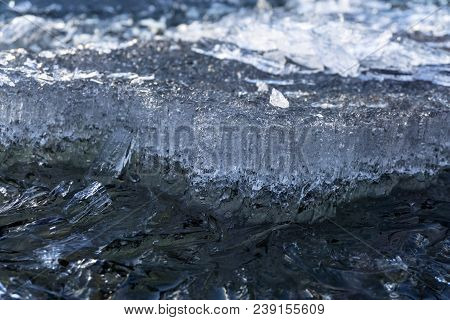 Background - Beautiful Fragment Of A Melting Ice Floe Complex Shape Closeup