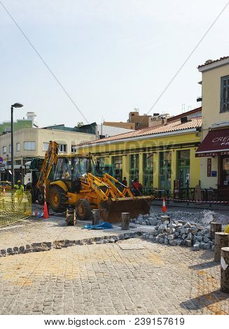 Greece, Athens, April 2018. Warm Sunny Morning In The Streets Of The Greek Capital. Repair Work On T