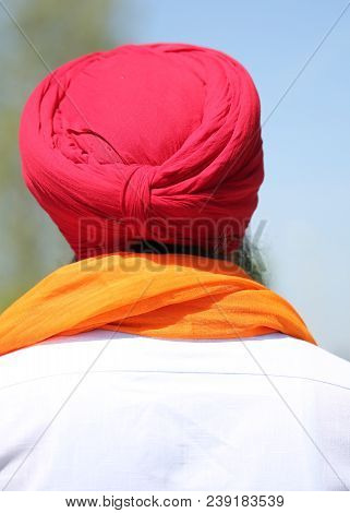 Senior Man With Turban On His Head And White Shirt
