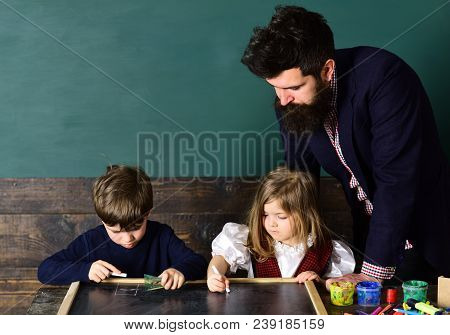 Student Passing An Exam Euphoric Girl Watching A Laptop In The Class. Kids Struggle When They Do Hom